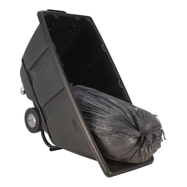 A black medium-duty bulk tilt truck with a large black trash bag inside.