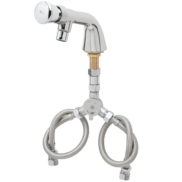 A chrome T&S metering faucet with flex inlets.