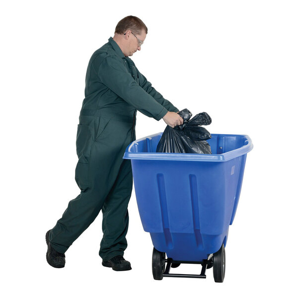 A blue light-duty bulk tilt truck with a 0.5 cubic yard capacity being loaded with a black trash bag by a person in work attire.