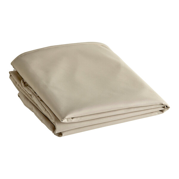 A folded beige polyester cantilever umbrella cover.