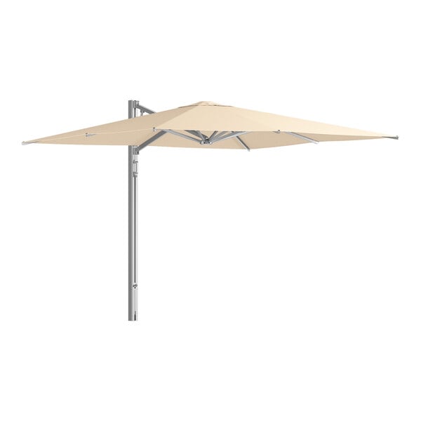 A large square sand-colored cantilever umbrella with a silver aluminum frame and hydraulic lift.
