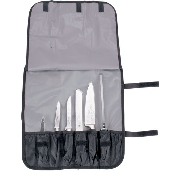 A Mercer Culinary Genesis 7 piece knife set in a black case.