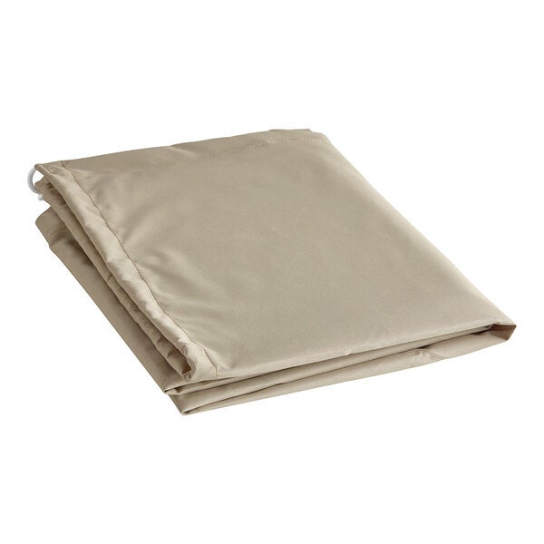 A folded beige polyester umbrella cover.