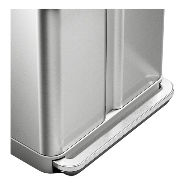 A brushed stainless steel dual compartment rectangular step-on trash and recycling can with a liner pocket.