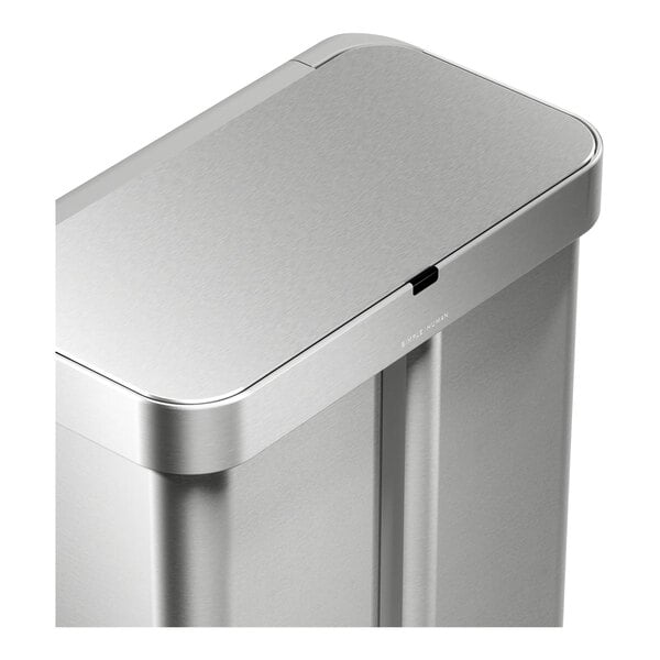A brushed stainless steel dual compartment rectangular sensor trash can and recycling can with voice and motion control.