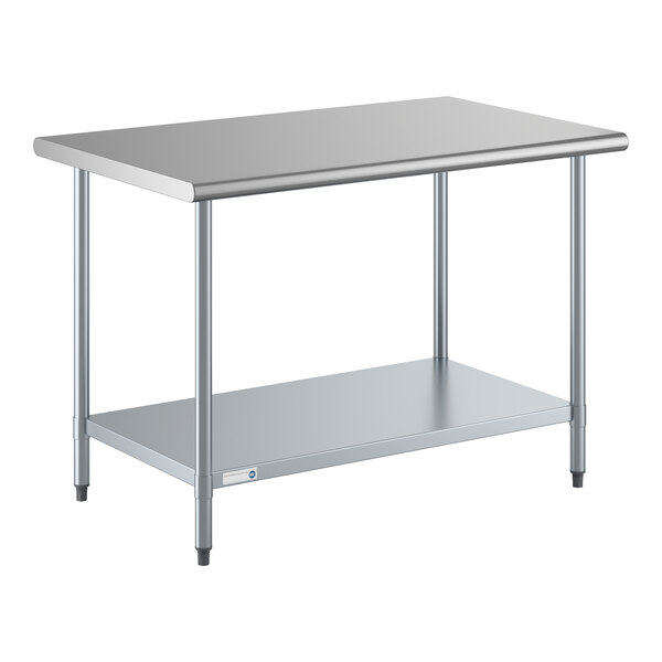 A stainless steel work table with an undershelf and four legs.