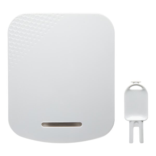 A white programmable air freshening system with a key.