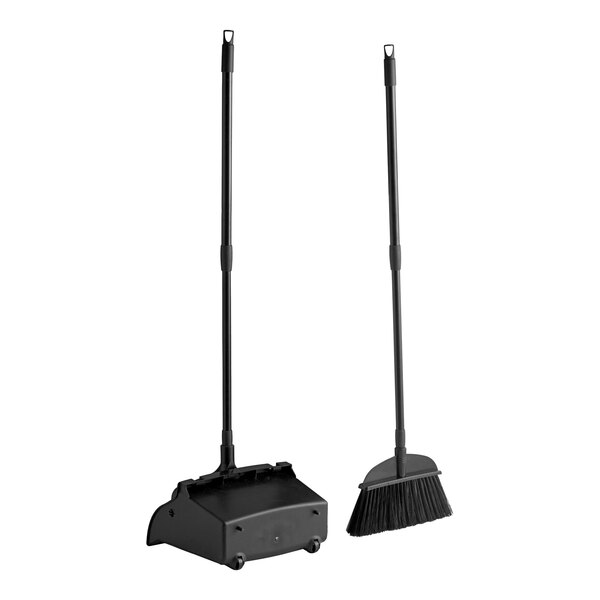A black open-lid lobby dust pan with a matching broom.