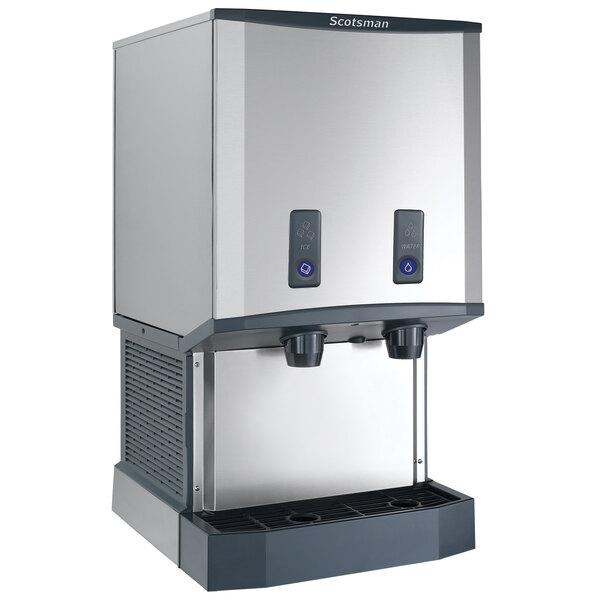 A stainless steel countertop nugget ice machine and water dispenser with push button controls.