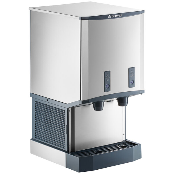 A stainless steel countertop nugget ice machine and water dispenser with push button dispensing.