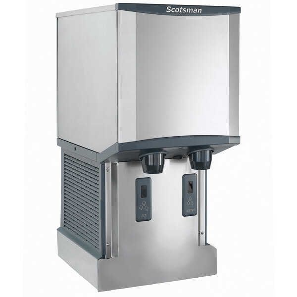 A stainless steel wall-mount air-cooled nugget ice machine and water dispenser with hands-free dispensing.
