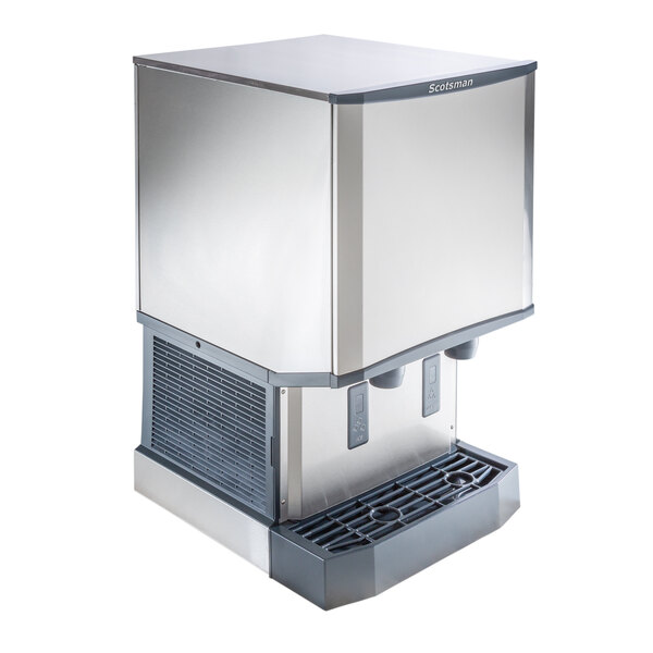 A stainless steel countertop nugget ice machine and water dispenser with hands-free dispensing and a 40 lb. bin capacity.