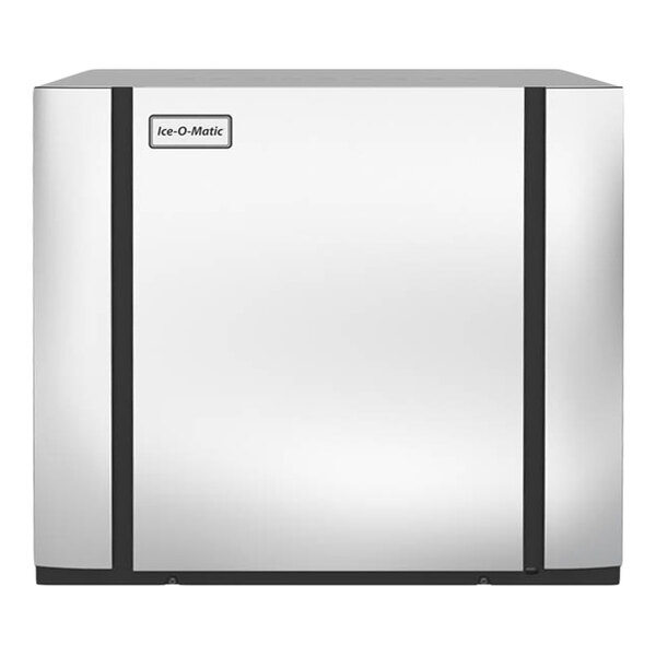 A commercial Ice-O-Matic remote-cooled ice machine with a stainless steel exterior.