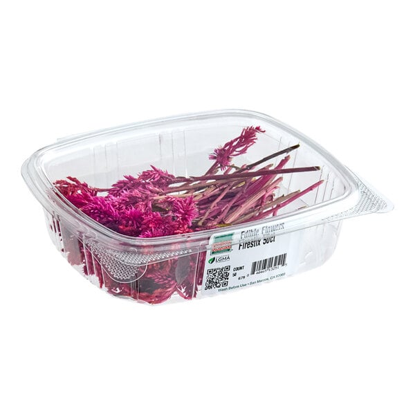 A clear plastic container filled with Fresh Origins Firestix edible flowers.