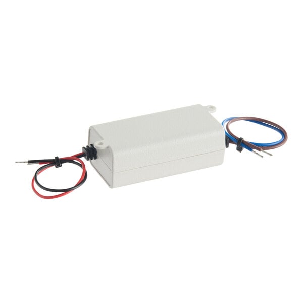 A rectangular Estella UVC ultraviolet disinfection lamp driver with attached red, black, blue, and brown wires.