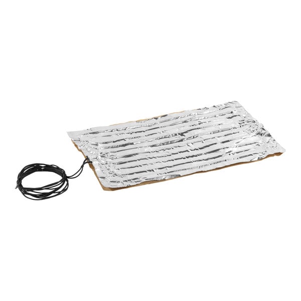 A rectangular defrost element with a metallic surface and an attached black power cord.