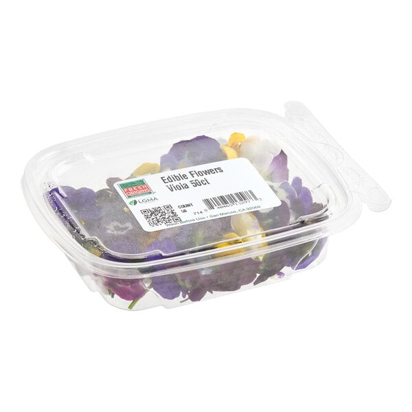 A plastic container of Fresh Origins viola edible flowers.