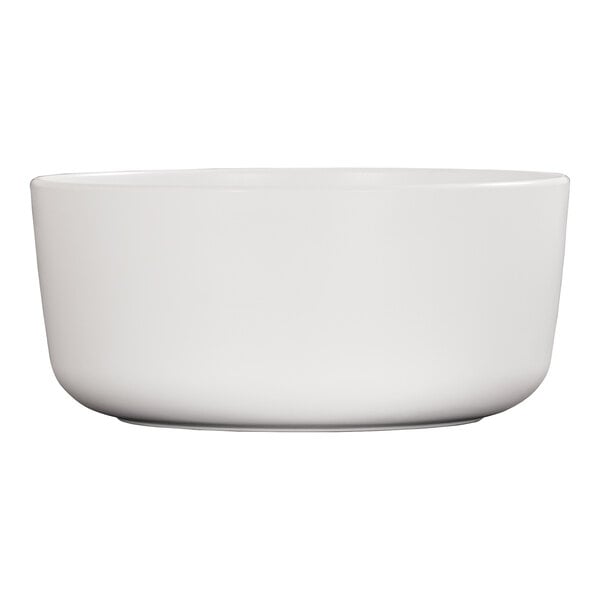 A large white round melamine serving bowl.