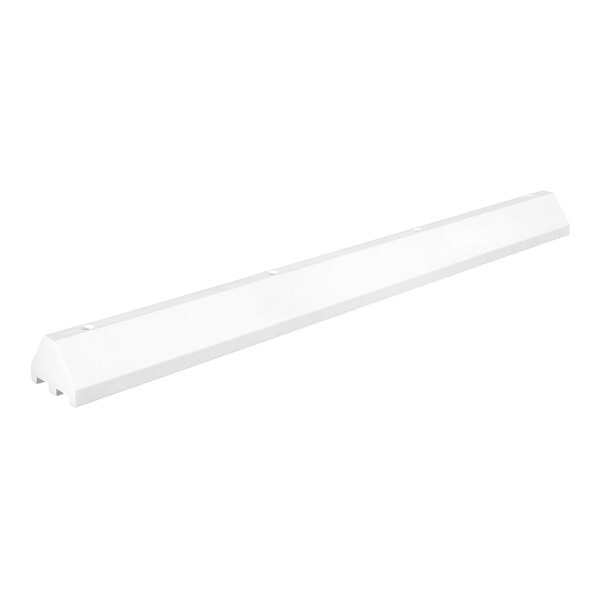 A long white plastic truck stop barrier.