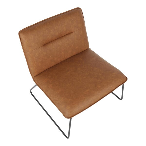 A modern accent chair with camel-colored faux leather upholstery and a black steel frame.