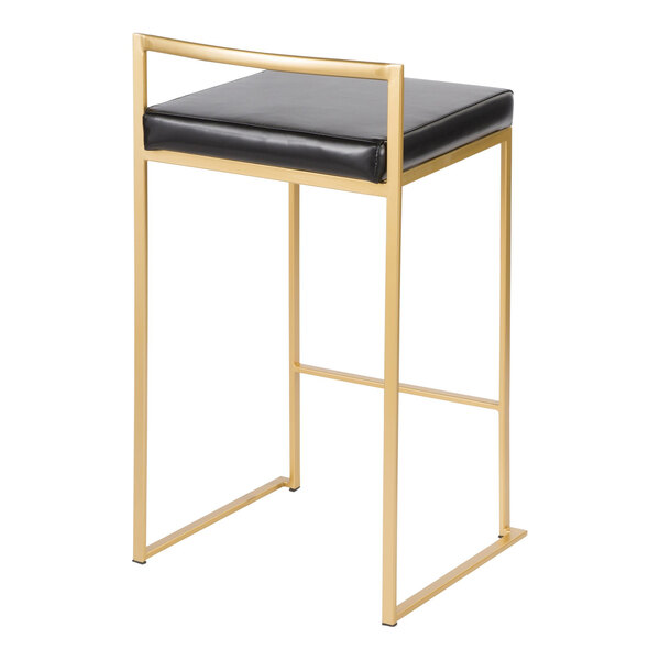 A modern counter height stool with a gold steel frame and a black faux leather seat.