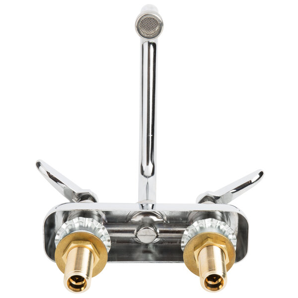 A close-up of a T&S deck-mount workboard faucet with brass tailpieces and escutcheon.