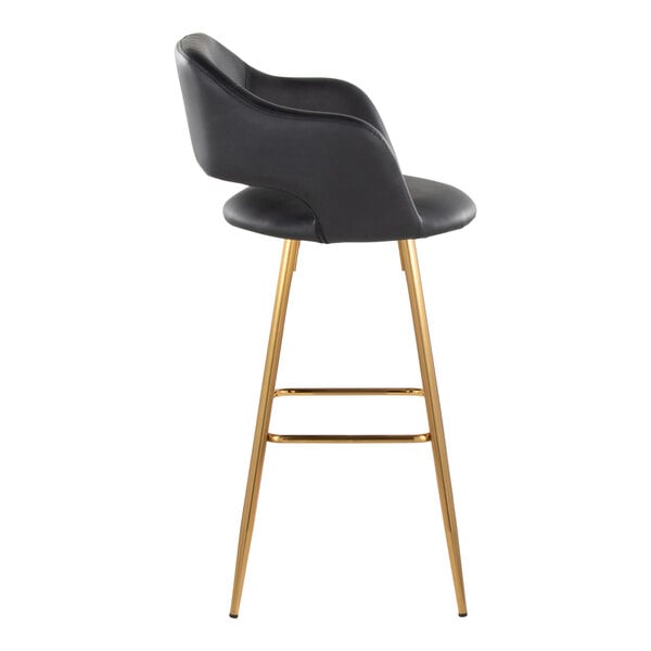 A modern barstool with a black faux leather bucket seat, armrests, and gold metal legs.