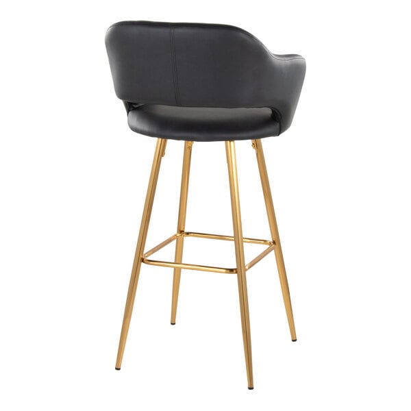 A black faux leather barstool with a bucket seat, armrests, and gold metal legs.