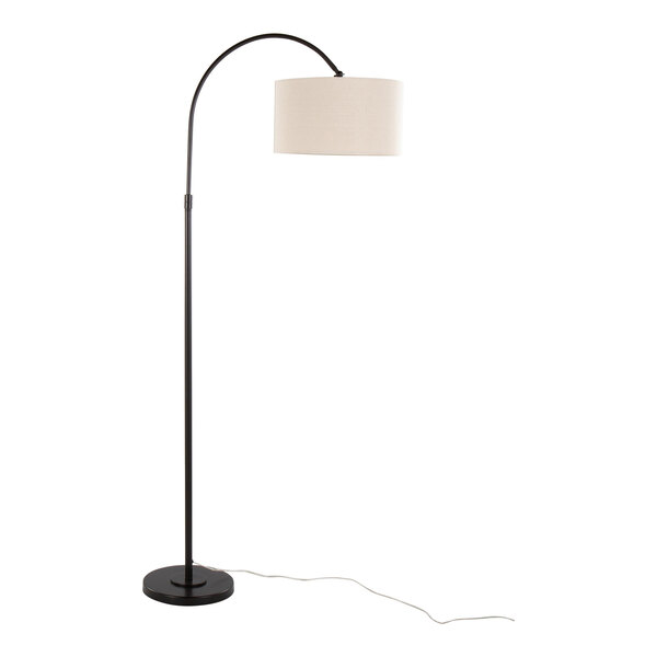 A tall oil bronze metal floor lamp with a curved arm and a natural linen drum shade.