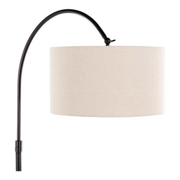 A floor lamp with an oil bronze metal curved stand and a natural linen drum shade.
