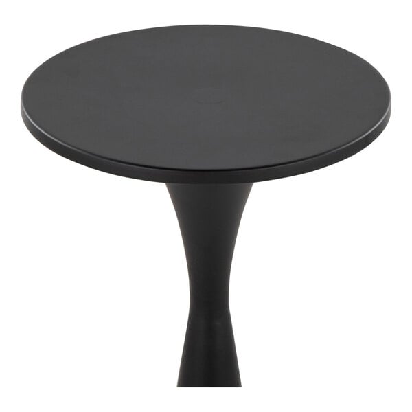 A round black steel side table with an hourglass-shaped base.