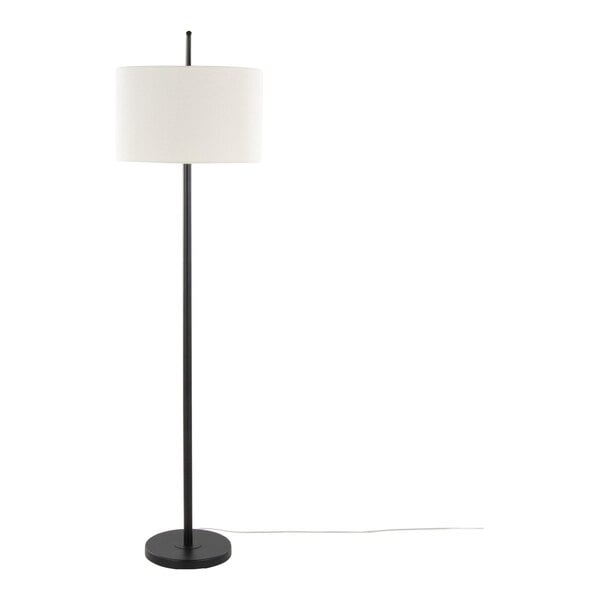 A matte black metal floor lamp with a natural linen drum shade.
