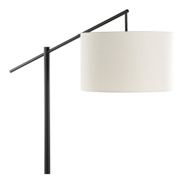 A matte black metal floor lamp with a natural linen drum shade.