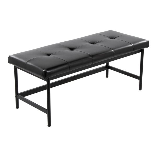 A black faux leather bench with a tufted cushion and a black metal frame.