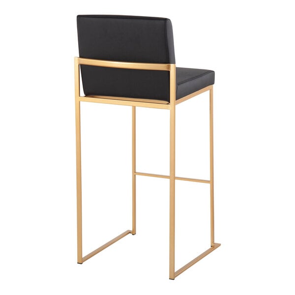 A high back barstool with a gold steel frame and black faux leather back and seat.