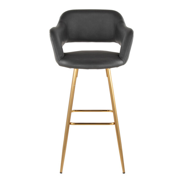 A modern barstool with a gray faux leather bucket seat, armrests, and gold metal legs.