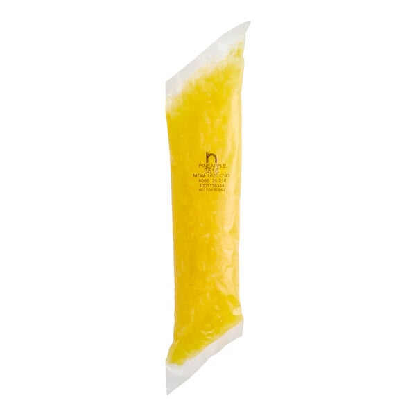 A clear plastic tube filled with yellow pineapple pastry filling.
