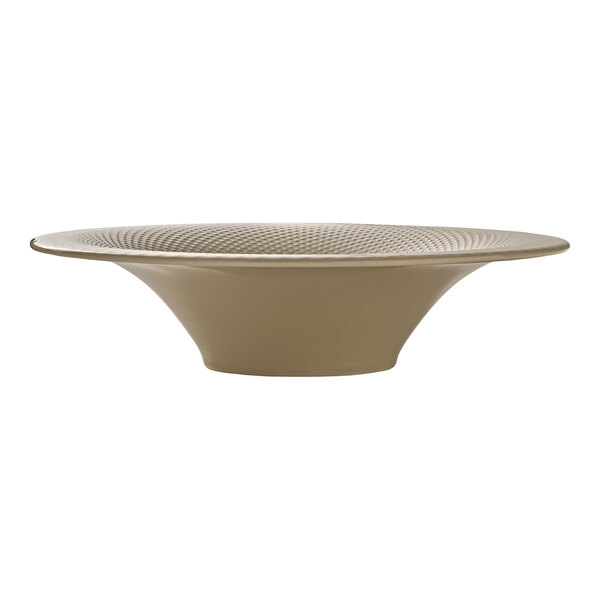 A round almond-colored porcelain deep coupe plate with a textured rim.