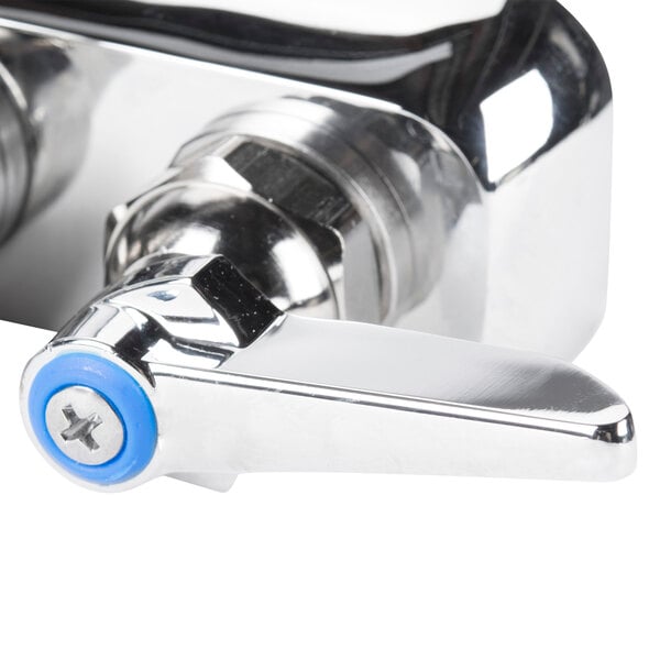 A chrome T&S wall mount workboard faucet with blue handles.