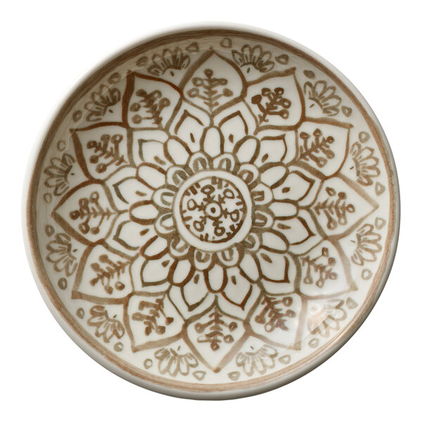 A round porcelain deep coupe plate with a sienna-colored floral and geometric pattern.