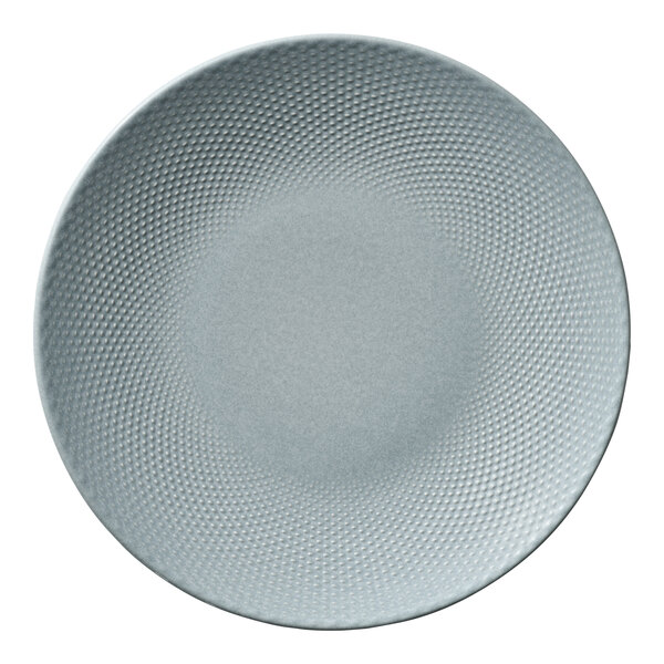 A round, light blue porcelain coupe plate with a textured rim.