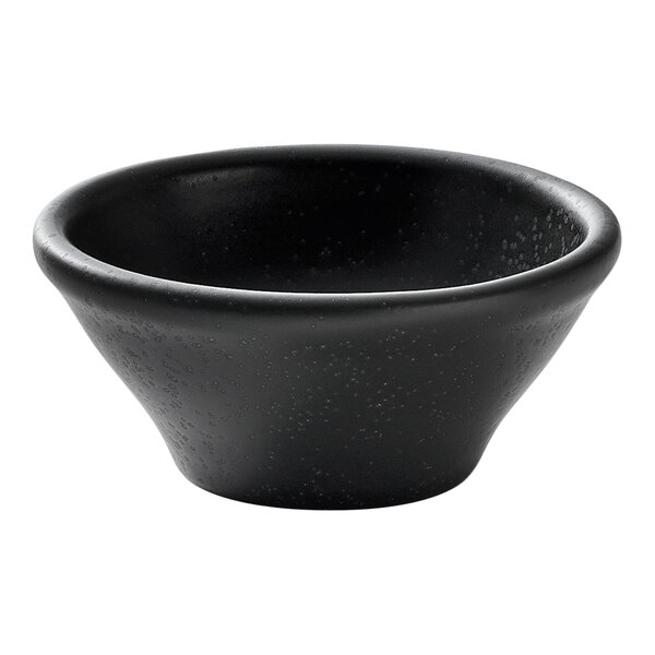 A small, round, black porcelain ramekin.