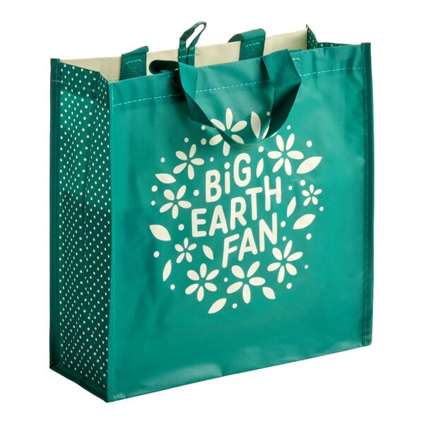 A teal reusable shopping bag with polka dot sides and the phrase 'Big Earth Fan' printed on the front.
