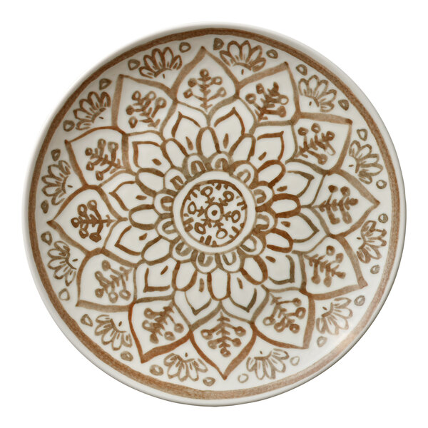 A round porcelain coupe plate with a sienna-colored floral and geometric pattern.
