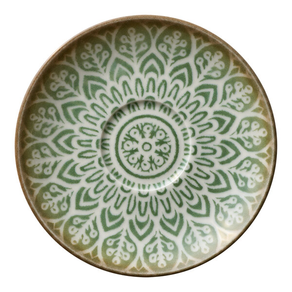 A round jade porcelain saucer with an intricate green and white floral pattern.