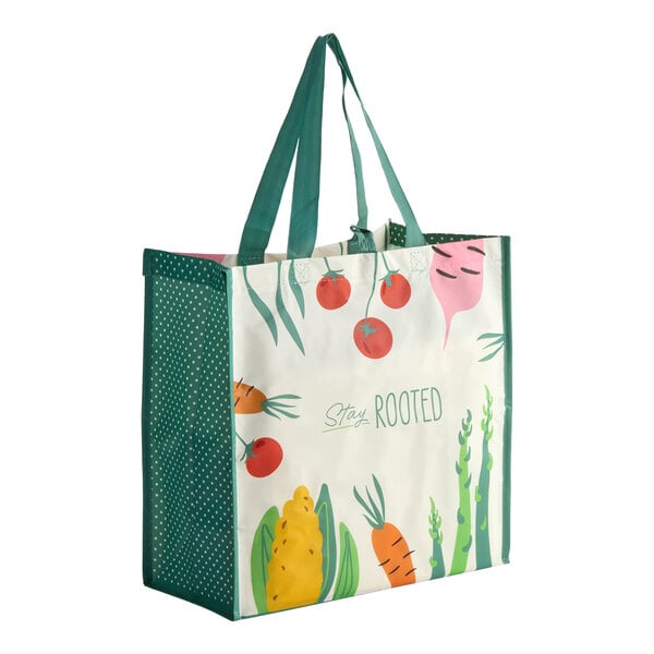 A medium-sized reusable shopping bag with green handles and a colorful vegetable design featuring the phrase 'Stay Rooted.'