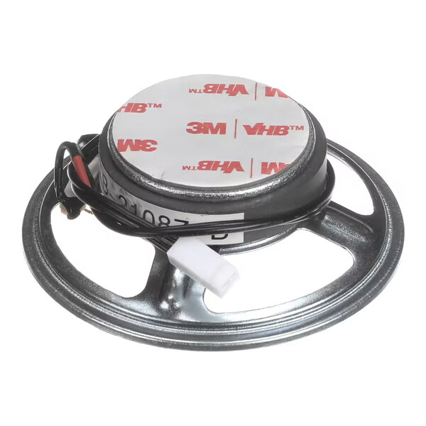 A round metal loudspeaker with attached wires and a 3M adhesive pad on the back.