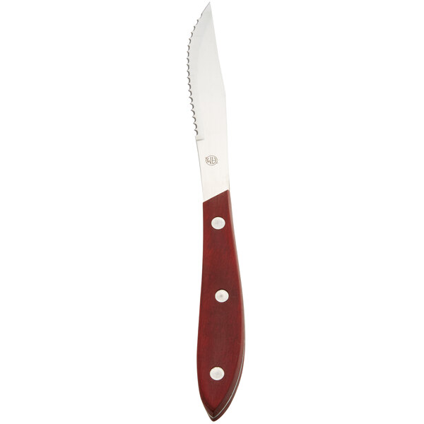 An American Metalcraft steak knife with a Pakkawood handle.