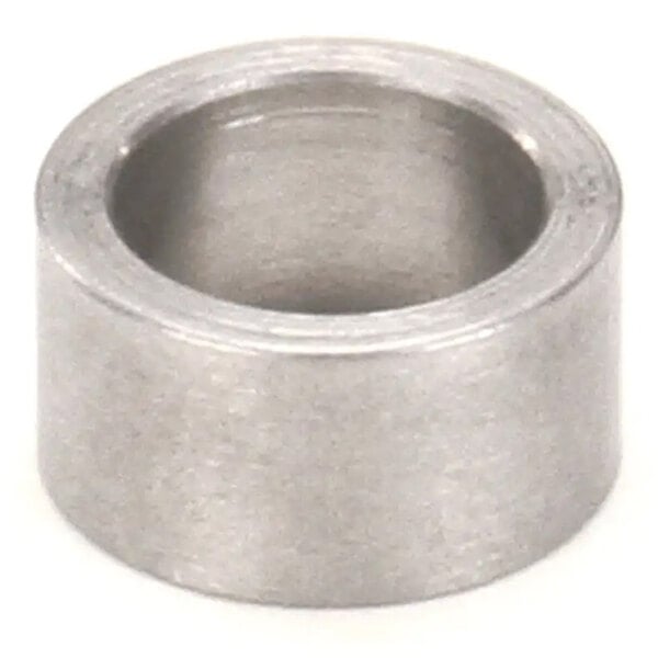 A cylindrical metal spacer with a hollow center.