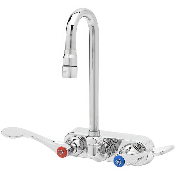 A chrome T&S wall mount faucet with two gooseneck spouts and wrist action handles.